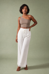 Loose high-waisted white pants