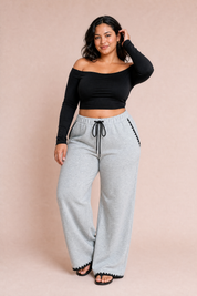 Pantalon gris large taille haute | Porté sur une silhouette plus ronde | Lounelle Paris