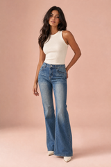 Faded flared blue jeans