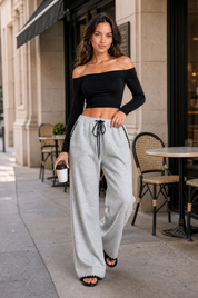 Pantalon gris large taille haute | Photo lifestyle | Lounelle Paris