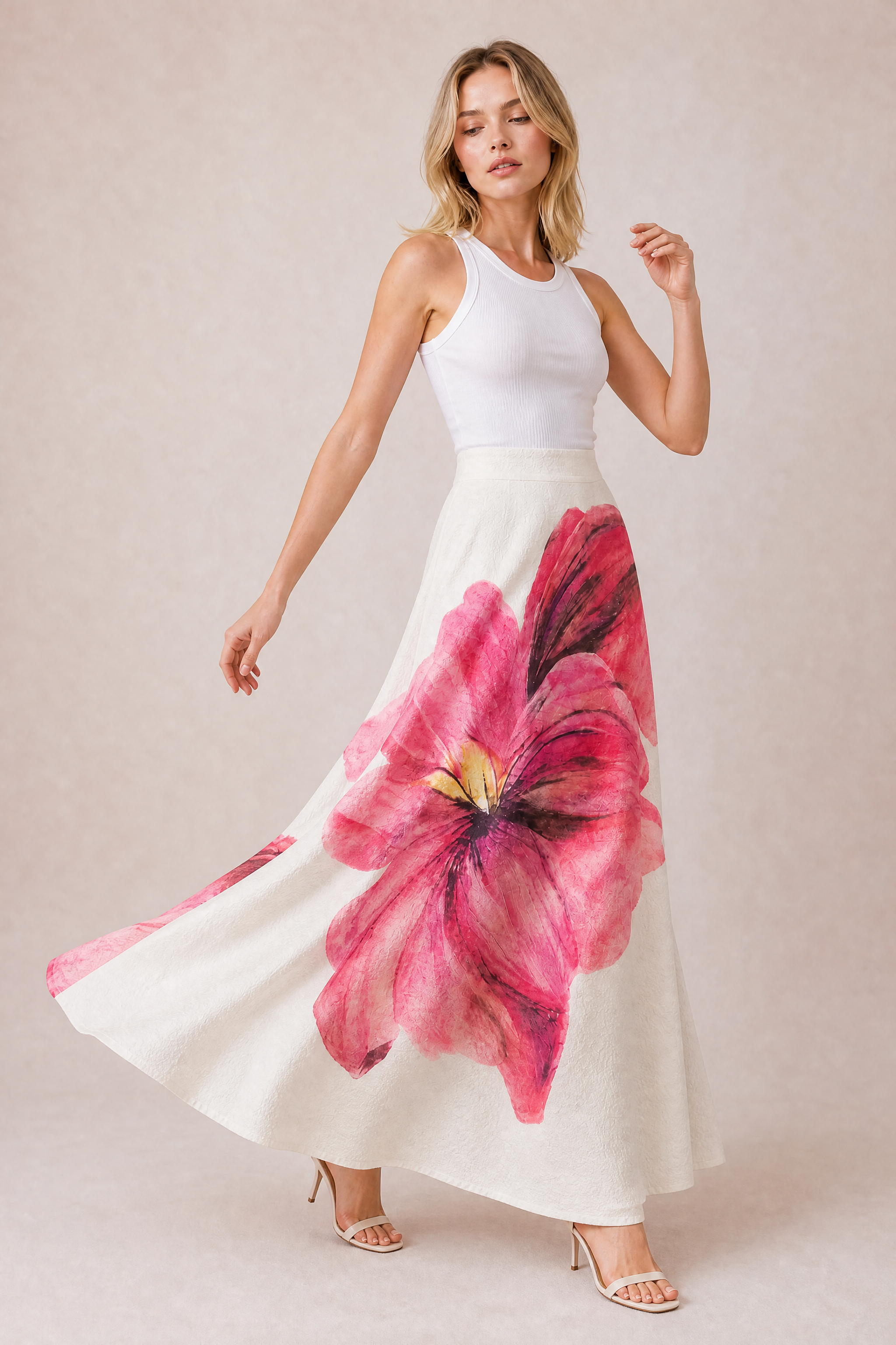 Jupe longue rose à imprimé floral | Vue en mouvement | Lounelle Paris