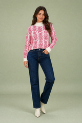 Pink jacquard roll neck jumper