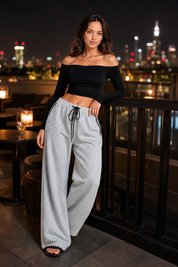 Pantalon gris large taille haute | Deuxième photo lifestyle | Lounelle Paris