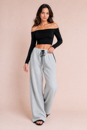 Pantalon gris large taille haute | Vue en mouvement | Lounelle Paris