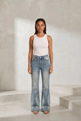 Flared washed blue jeans
