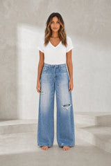 Medium blue wide-leg jeans with folded hem