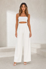 High-waisted wide-leg beige trousers