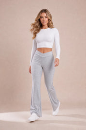 Pantalon gris taille en V évasé | Vue en mouvement | Lounelle Paris
