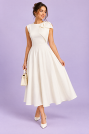 Robe midi blanche à encolure asymétrique et manche à nœud | Vue de face | Lounelle Paris