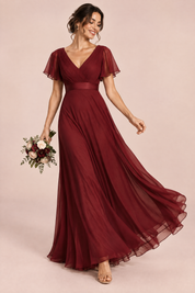 Robe longue plissée bordeaux à col V | Vue en mouvement | Lounelle Paris