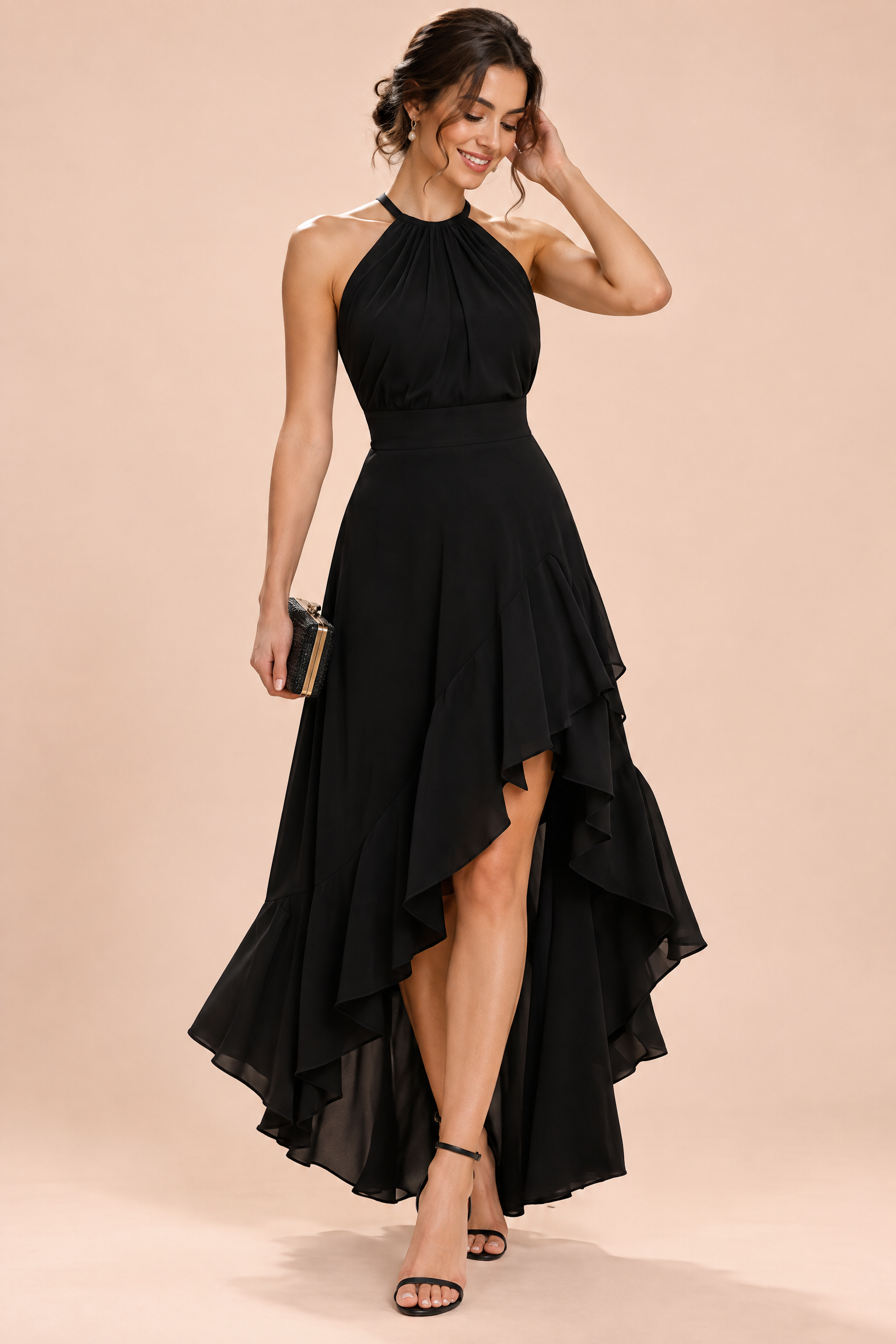 Robe noire à volants asymétriques et encolure dos nu | Vue de face | Lounelle Paris