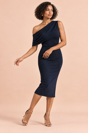 Robe midi bleu foncé à encolure asymétrique avec ceinture | Vue en mouvement | Lounelle Paris