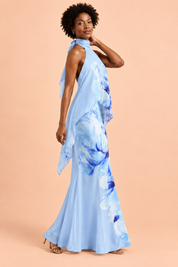 Jupe longue asymétrique bleue à imprimé floral en satin mat | Vue de dos | Lounelle Paris