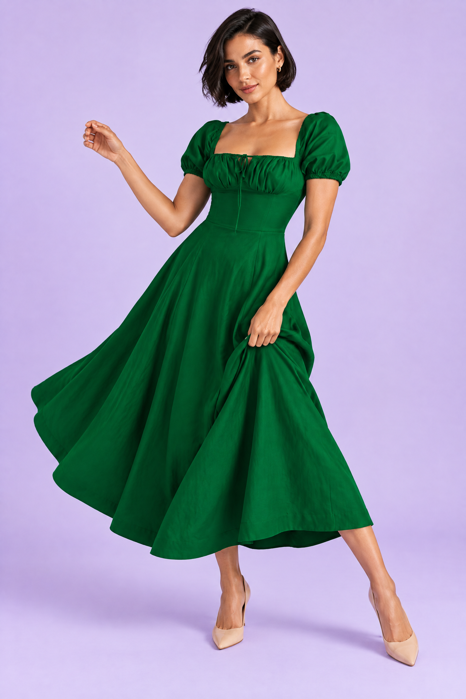 Robe midi vert foncé à coupe trapèze et encolure carrée | Vue en mouvement | Lounelle Paris