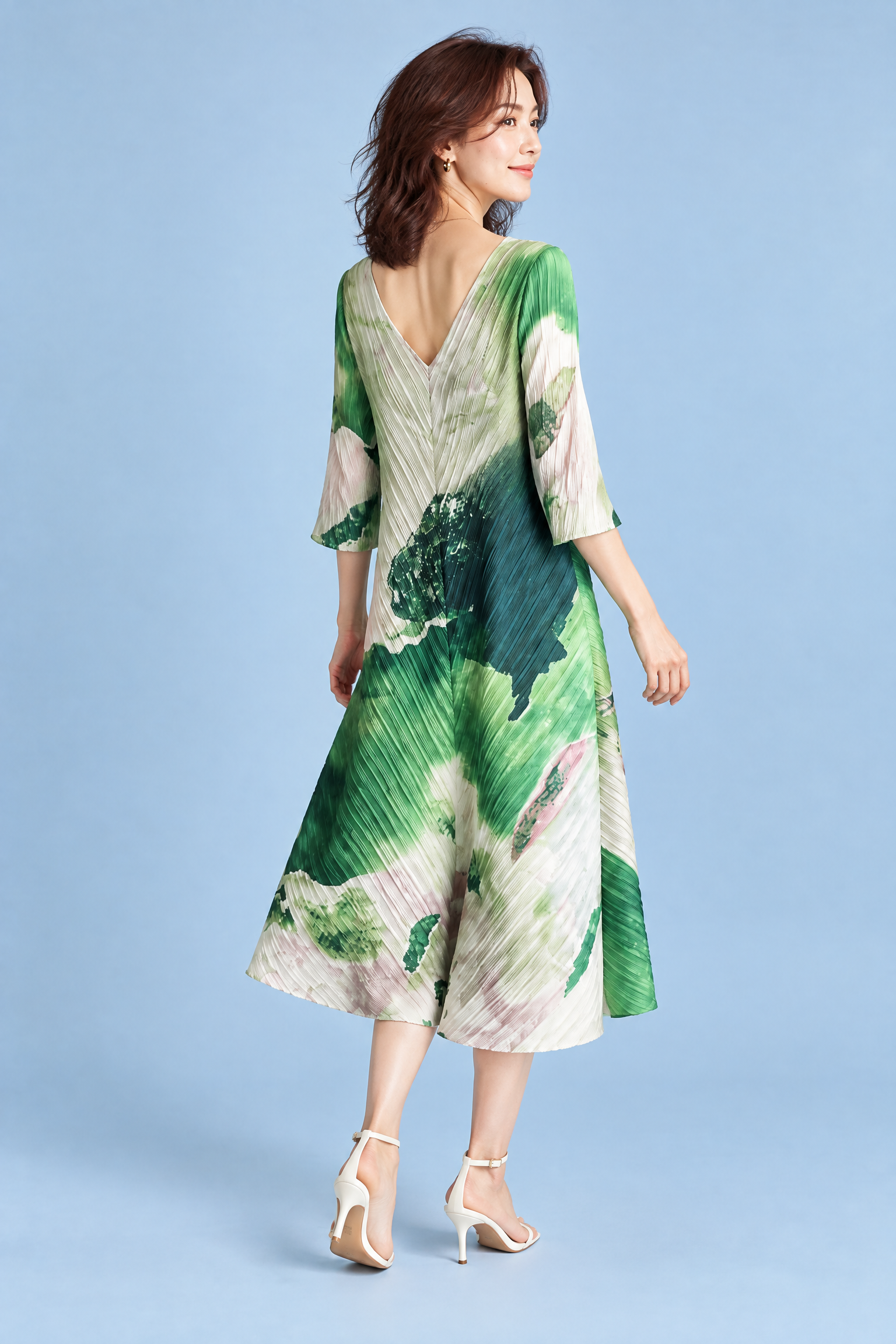 Robe midi plissée verte à imprimé abstrait | Vue de dos | Lounelle Paris
