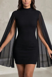Robe noire col montant manches cape | Lounelle Paris