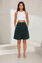 High-waisted pleated mini skirt